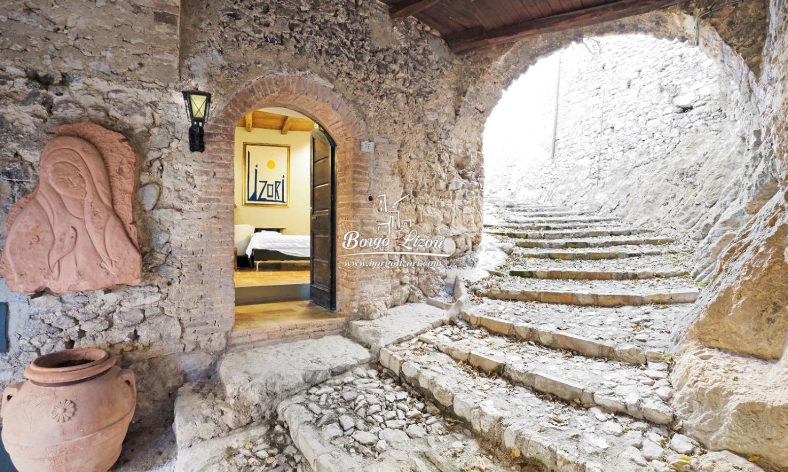 Relais Borgo Lizori Country House Campello sul Clitunno Bagian luar foto
