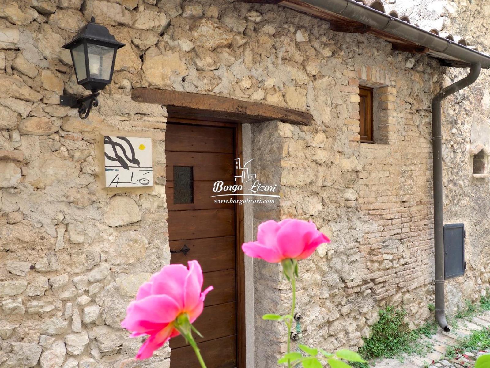 Relais Borgo Lizori Country House Campello sul Clitunno Bagian luar foto